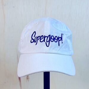Supergoop! Baseball cap hat in white and blue